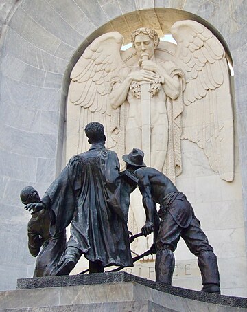 Sculpted figures on the obverse side Obverse side of National War Memorial (South Australia) -- close-up view.jpg