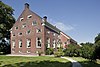 Large farmhouse in Midwolda, a result of the history of Oldambt as the granary of the province. The building is a national monument, and nowadays houses a public sauna.