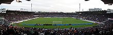 Vue, depuis les tribunes, sur un terrain de football