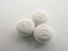 Paroxetine, known as Paxil and Seroxat Paroxetine pill.jpg