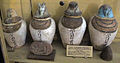 Periodo tolemaico, quattro vasi canopi con testa a forma dei figli di horus.JPG