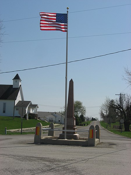 World War I veterans memorial in Pickrelltown (2010 photo). The 8 ft (2.4 m) high granite monument was erected in 1921, and has twice been rebuilt aft