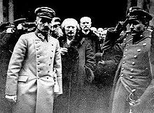 Gen. Jozef Pilsudski (first on the left) Ignacy Jan Paderewski (next to Pilsudski in the a civil coat) and Stanislaw Wojciechowski (behind Paderewski), future second President of Poland, during the opening ceremony of the Legislative Sejm, 9 February 1919. Pilsudski and Paderewski.jpg