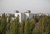 Now a ghost town, Pripyat in April 1986 was home to 50,000 people. The ferris wheel in the foreground is a grimly ironic reminder of the normality of life before the reactor accident.