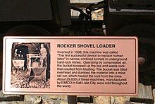 An engraved copper plaque next to the Rocker Shovel at Bingham Canyon Mine. Rocker Shovel Loader info (3671600937).jpg