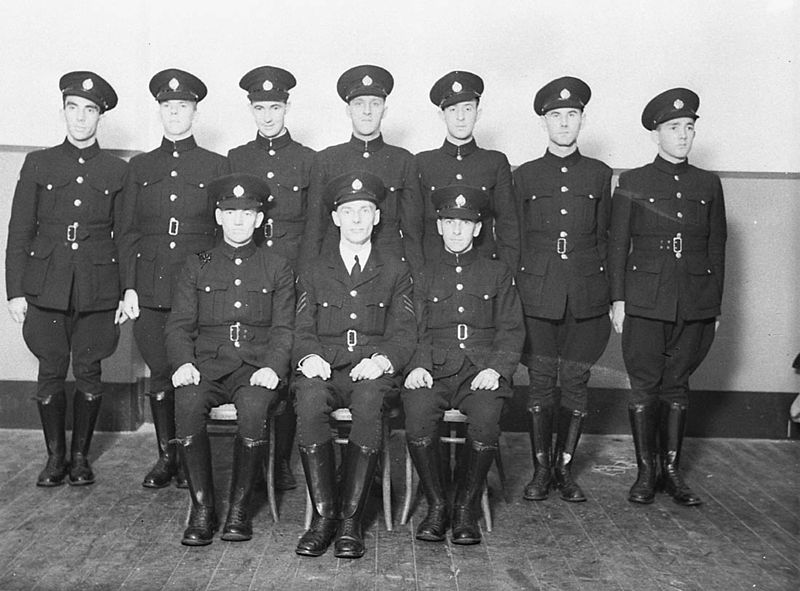 File:SLNSW 9885 A group of nine RAAF Citizen Air Force ground staff with their Sergeant in preWW II uniform tunics buttoned to the neck peakedcap navy blue breeches and black leggings.jpg