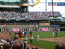 The sausages running along the 3rd base side. Sausage race.jpg