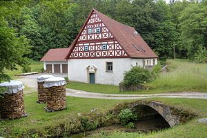 Jewelery side of the Schwarzmühle.  In the foreground: Weismain with stone bridge