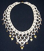 Necklace made from crochet lace, pearls, and sterling silver.