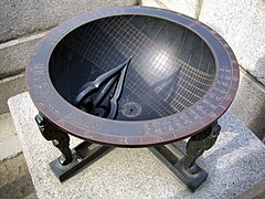 A modern hemispherium in Gyeongbok Palace in Seoul, South Korea. 37°34′43″N 126°58′38″E﻿ / ﻿37.578611°N 126.977222°E﻿ / 37.578611; 126.977222﻿ (Gyeongbok Palace hemispherium) The pointer tip acts as the nodus; the height of the nodus-shadow gives the time of the year.