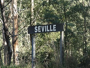 Seville railway station Victoria station sign.jpg