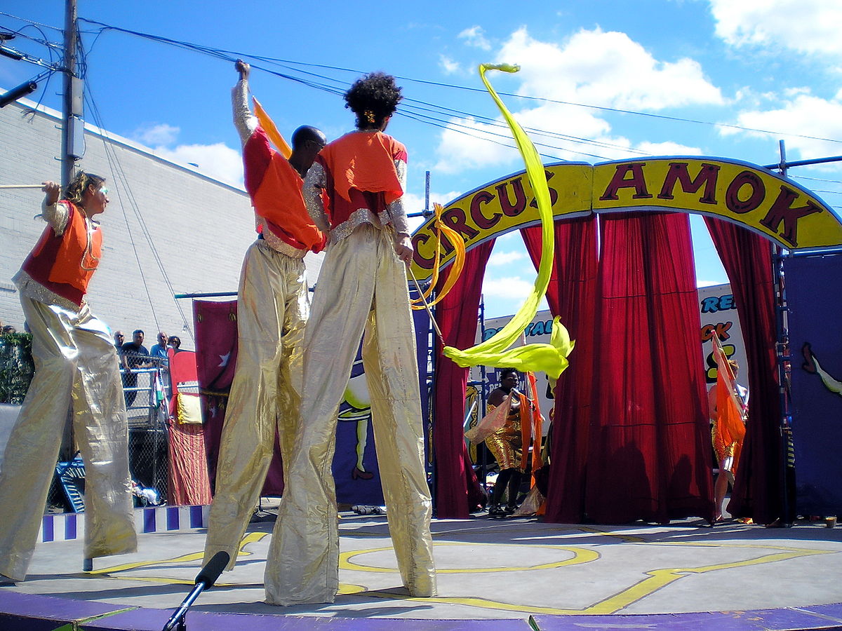 1200px-Stilt_Walkers_at_Circus_Amok_by_David_Shankbone.jpg