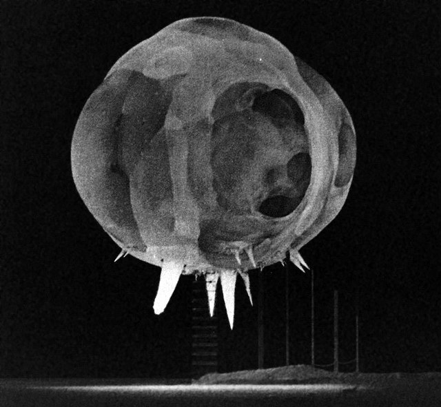 The bright spikes extending below the initial fireball of one of 1952's Operation Tumbler–Snapper test shots, are known as the "rope trick effect". Th