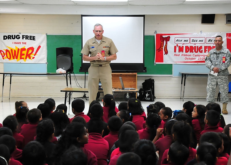 File:US Navy 111013-N-ET019-816 Lt. Alan Fleming, a Navy chaplain assigned to the submarine tender USS Frank Cable (AS 40), tells students from Henry B.jpg