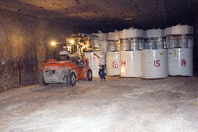 Technicians emplacing transuranic waste at the Waste Isolation Pilot Plant, near Carlsbad, New Mexico