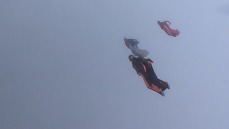 File:Wingsuit Flock in a Cloud over Massachusetts (6367633809).jpg