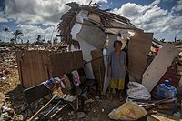 131115-N-BD107-734 GUIUAN, Eastern Samar Province, Republic of the Philippines (Nov. 15, 2013) A Guiuan woman stands outside of her makeshift shack in the aftermath of Super Typhoon Haiyan 131115-N-BD107-734.jpg