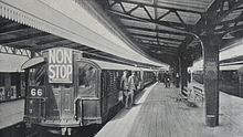 1906 stock at Golders Green station on 13 November 1911, the start of 'non-stop' service. 8 morning, 9 evening and 2 'theatre' trains didn't stop between Hampstead and Euston. The last non-stop trains ran in 1924. 1906 stock at Golders Green station 1911.jpg