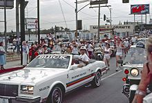 In this July 1984 photo, an advertisement poster of KLAC can be seen in the background during the 1984 Summer Olympics torch relay. 1984 Torch Runners In Harbor Gateway.jpg