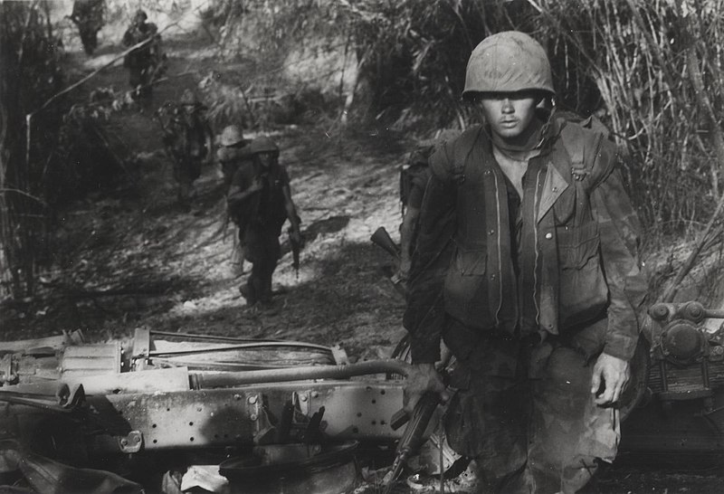 File:2.3 Marines pass a destroyed North Vietnamese truck south of Khe Sanh.jpg