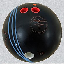 Track flare is progression of the ball's oil track (simulated in blue) reflecting migration of the ball's axis of rotation on successive revolutions. 20200109 Simulated track flare lines on bowling ball.jpg