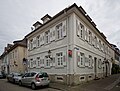 Modellhaus mit Torfahrt in Ecklage