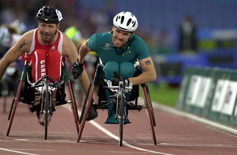 File:231000 - Athletics wheelchair racing 800m T52 final Greg Smith gold action - 3b - 2000 Sydney race photo.jpg