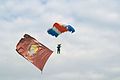 Member of 63rd Paratroop Battalion from Special Brigade of Serbian Army landing with flag during the military exercise "Ušće 2011".