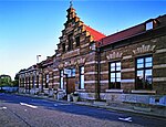 Эта железнодорожная станция является важной частью железнодорожной линии от Претории до залива Делагоа, которая была построена между 1890 и 1894 годами известной компанией Nederlandsche Zuid-Afrikaansche Spoorwegmaatschappij. Станция построена, вероятно, в 1894 году и Тип участка: Здание вокзала.