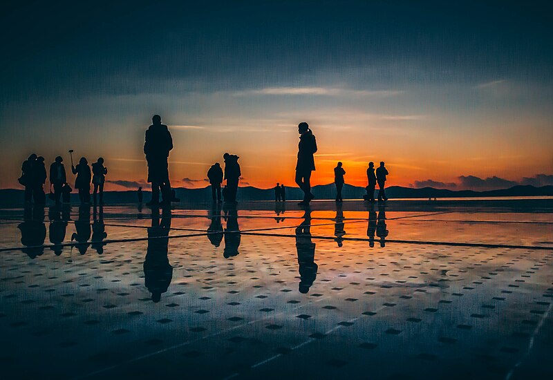 File:A group of people during sunset in Zadar, Croatia.jpg