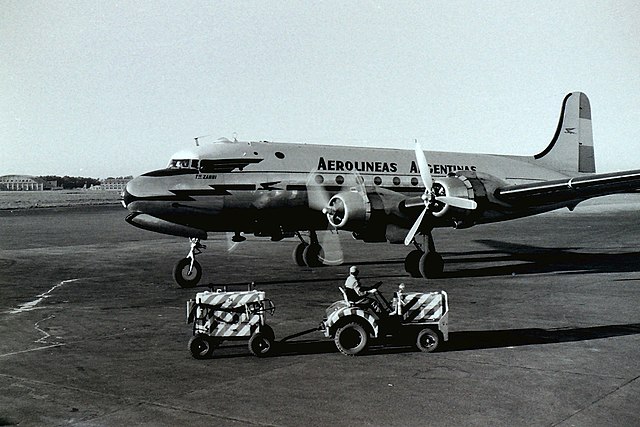 An Aerolíneas Argentinas DC-4 at Ministro Pistarini International Airport, circa 1958