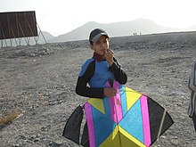 An Afghan boy with a kite Afghan boy with kite.jpg