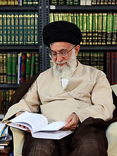 Ali Khamenei reading book 01.jpg
