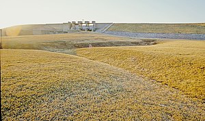 The Alum Creek Dam spillway is perched high on the abutment; this prompted concerns within the Army Corps of Engineers about deep-seated sliding.