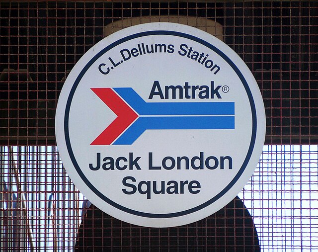 Classic Amtrak logo displayed at the Oakland – Jack London Square station, California