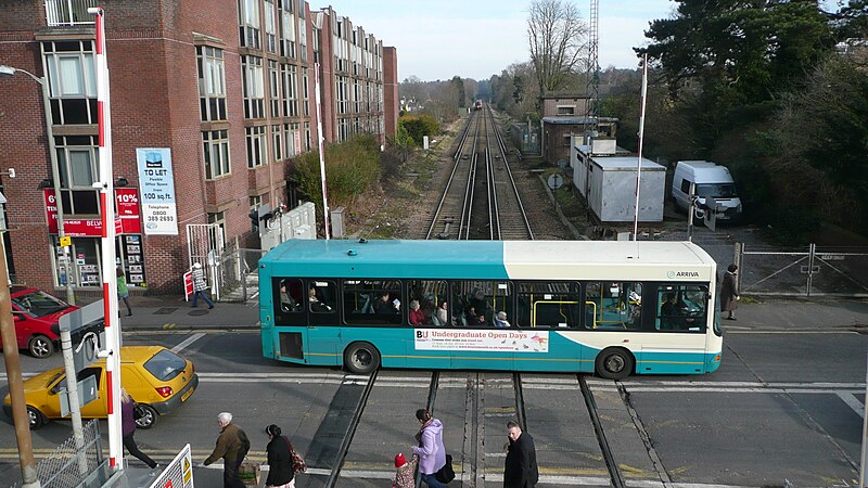 File:Arriva Guildford & West Surrey 3935 GK52 YUY and Camberley level crossing.JPG
