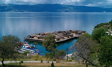 The Bay of Bones, an outdoor archaeological museum on Lake Ohrid that features a reconstruction of a Neolithic lake settlement (pictured).