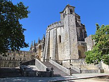 The famous round church (rotunda) of the Convent of Christ was built in the second half of the 12th century. Like some other templar churches throughout Europe, was modelled after the Dome of the Rock in Jerusalem. Castelo dos Templarios - Tomar (10638102313).jpg