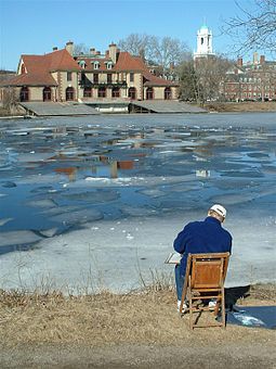 A view from Boston of Harvard's Weld Boathouse and Cambridge in winter. The Charles River is in the foreground. Charles River Cambridge USA.jpg