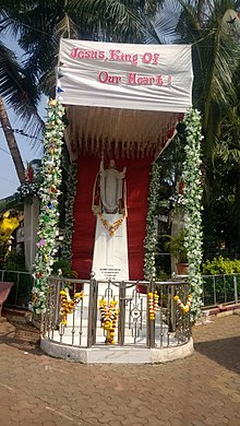 Christ the King statue installed at the entrance of the Church Christ the King statue.jpg