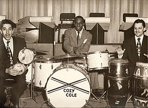 Cozy Cole (center) was the second artist to top the combined Hot R&B Sides chart, introduced in October. Cozy Cole.jpg