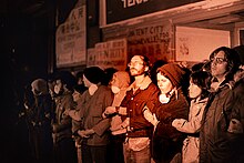 Wendy Yoshimura, second from right, in front of the International Hotel, with protesters on eviction night, August 4, 1977 Demonstrators at the International Hotel in San Francisco, 1977.jpg