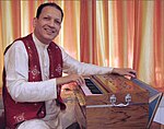 Dr. Vidyadhar Oke with 22-microtone harmonium Dr Vidyadhar Oke.jpg