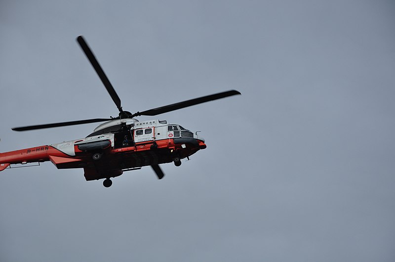 File:Eurocopter AS 332 L2 of Hong Kong Government Flying Service with Flight Operations Manager looking for casualties.jpg