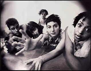 Melanie Hahn Roche and Dancers at the Flytrap warehouse immersion, 1991. Bottom, right to left: Keita Whitten, Melanie Hahn Roche, Stavit Allweis. Flytrap Dancers Keita Whittten & Melanie Han's Dancers.jpg