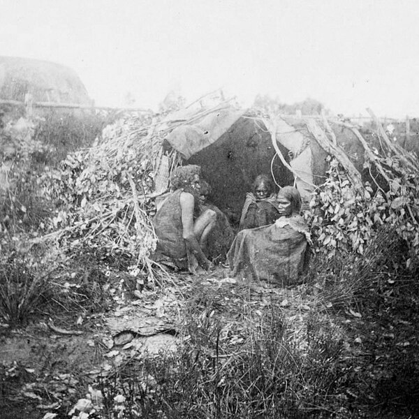 File:Four Aboriginal people at the entrance to their dwelling, Western Australia, Gustav Riemer ca. 1876.jpg