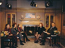 Gay Courter sits alongside Charles Gibson at ABC's Good Morning America in February 1995 with several youth Courter helped get adopted Gay on Good Morning America.jpg