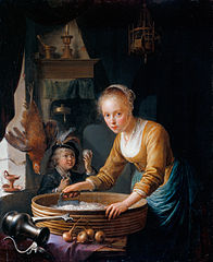 Jeune fille hachant des oignons