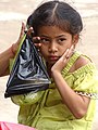 Girl in Market - Kratie - Cambodia (48403227936).jpg