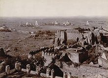 View of Qutb Shahi Tombs from the Golkonda fort Golconda Tombs from Fort, 1902-03.jpg